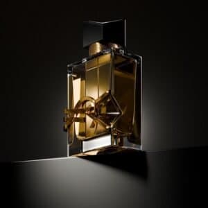 A bottle of perfume sitting on top of a table