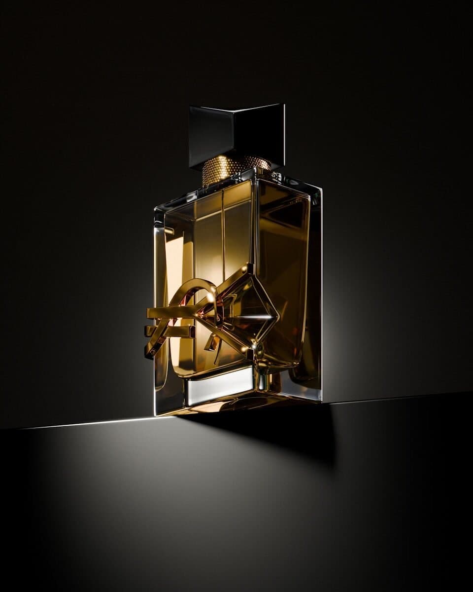 A bottle of perfume sitting on top of a table